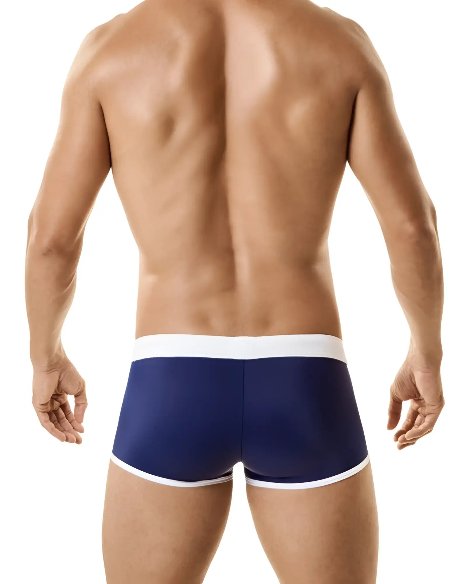 Rear view of a man wearing navy blue jersey swim trunks with a white waistband and trim, isolated on white.