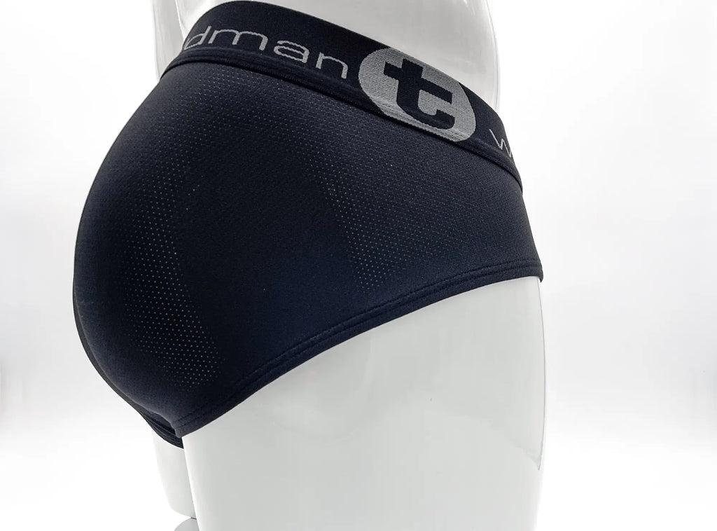 Black mens briefs with perforated mesh texture and gray wildmant logo band featuring t emblem in black