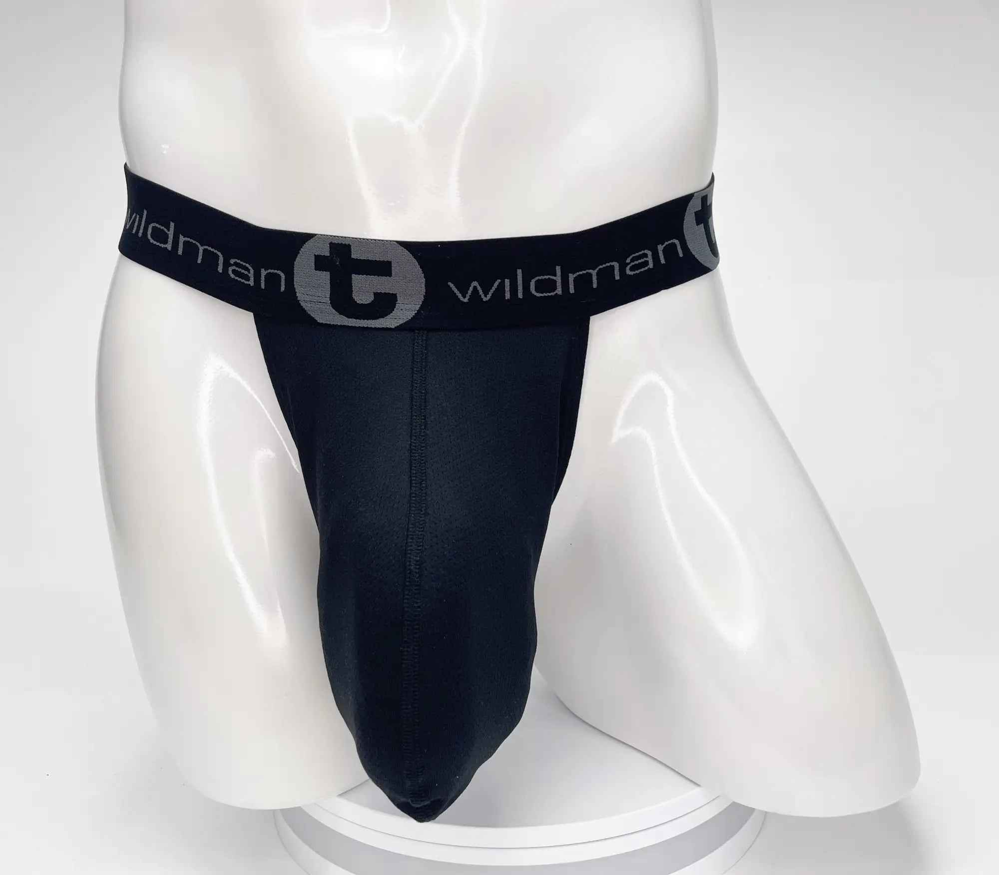 Black mesh strapless pouch on a white mannequin with a branded elastic waistband reading "WildmanT".