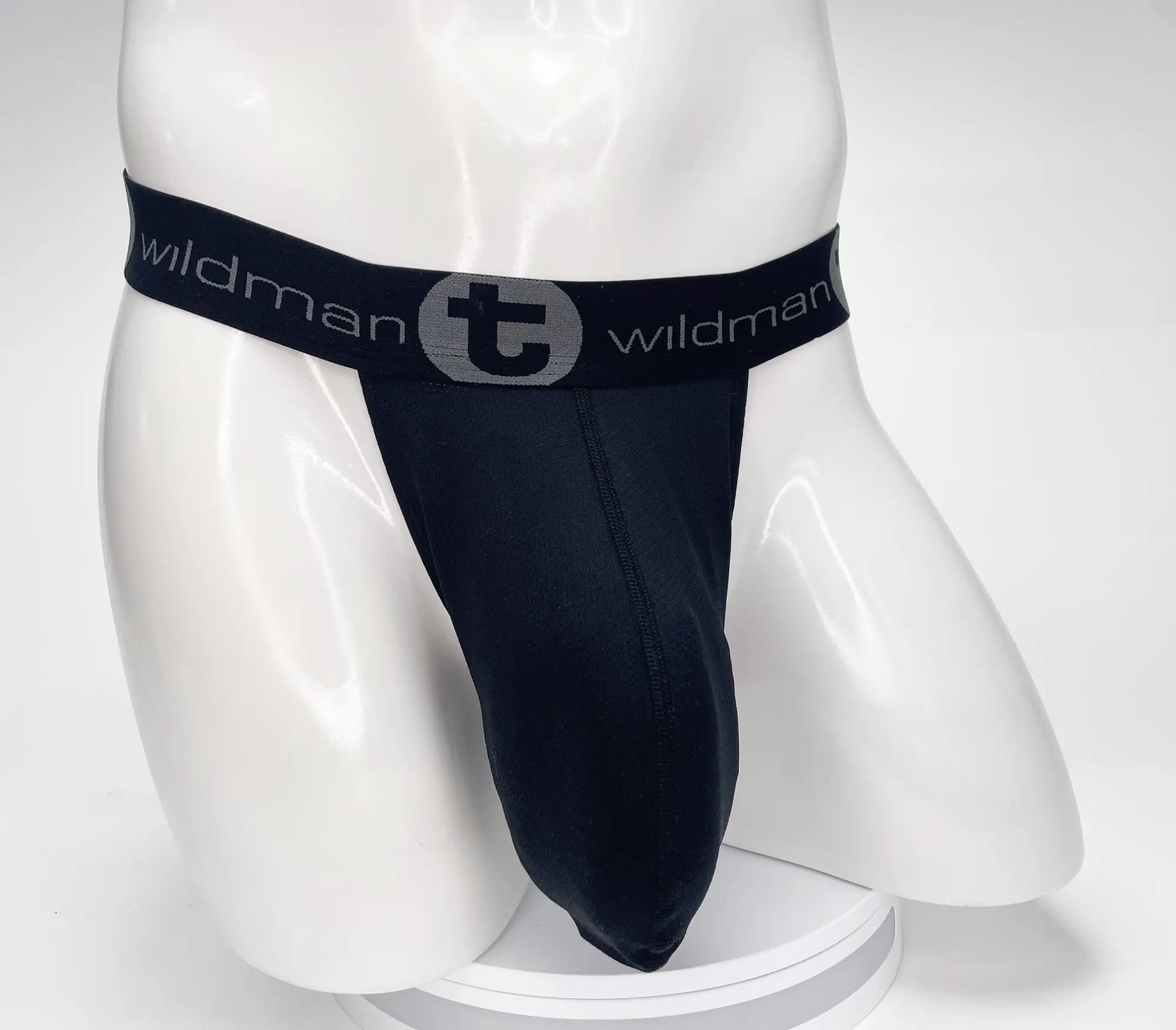 Black WildmanT strapless mesh pouch on a white mannequin with a branded elastic waistband.
