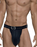 Black WildmanT strapless mesh pouch with a branded elastic waistband on a muscular male torso.