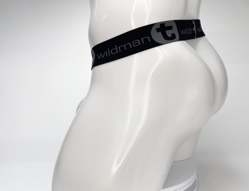 White WildmanT mesh strapless pouch on a mannequin, featuring a wide black waistband with grey branded logo.