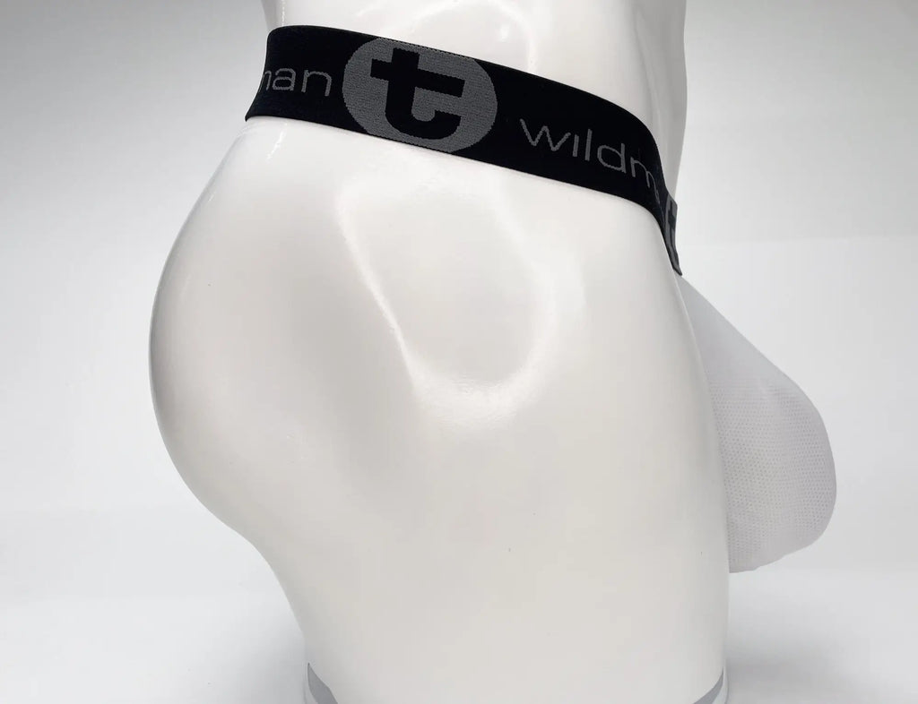 White WildmanT mesh strapless pouch on a mannequin, featuring a black elastic waistband with grey branded logo.