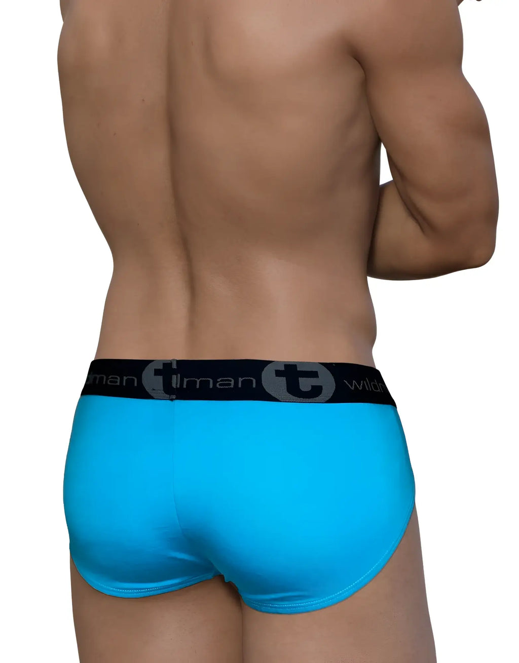 Baby blue WildmanT Modal brief with black elastic waistband featuring the brand logo, worn on a male torso.