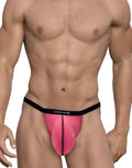 Pink modal micro thong with a large pouch, black trim, and a branded waistband on a fit male torso.
