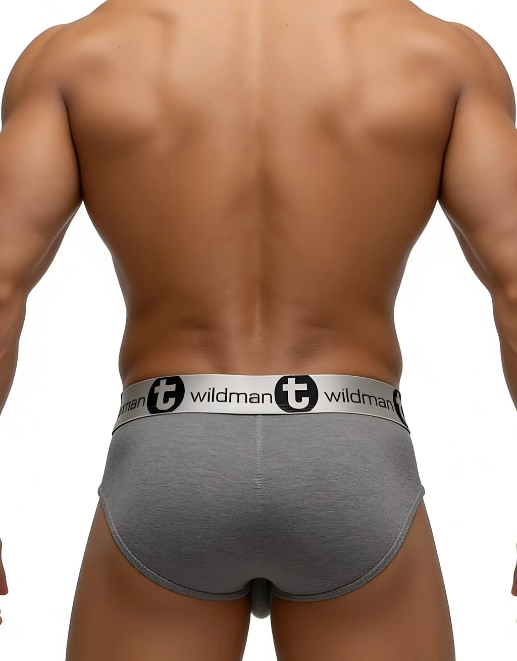 Rear view of muscular man wearing gray WildmanT modal briefs with branded silver waistband.