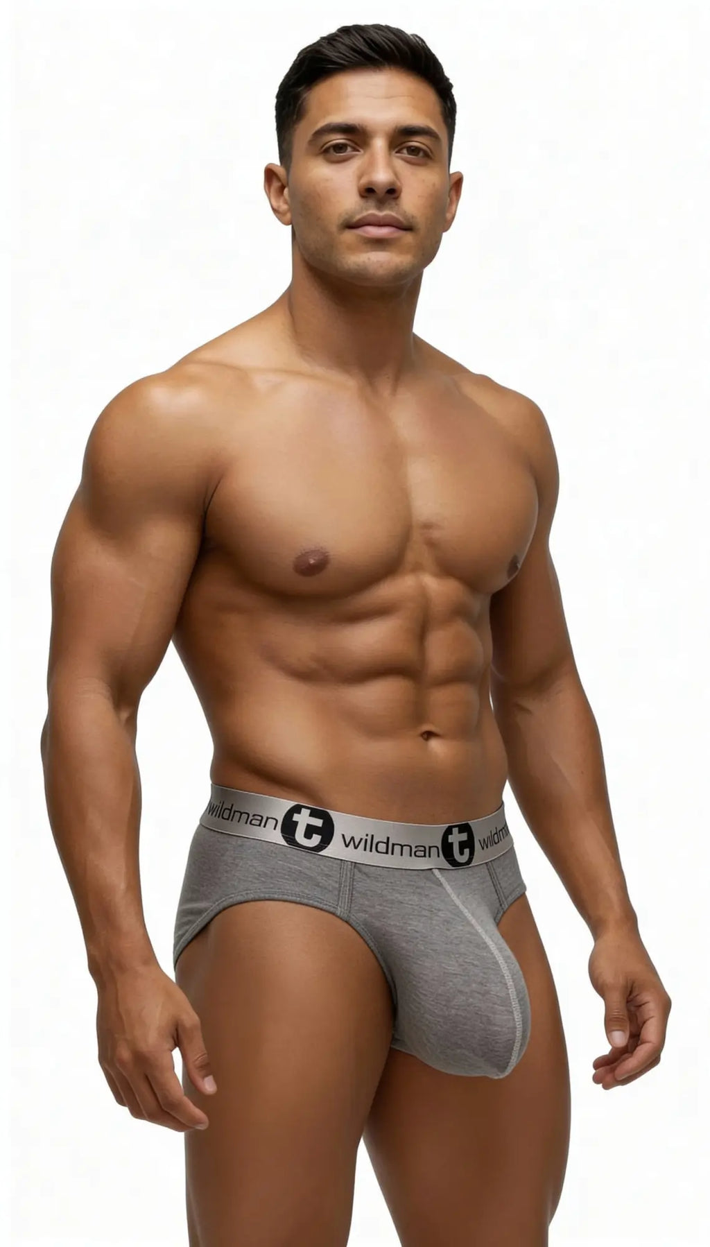 Gray modal men’s brief with a contoured pouch and branded elastic waistband, worn by a muscular man.