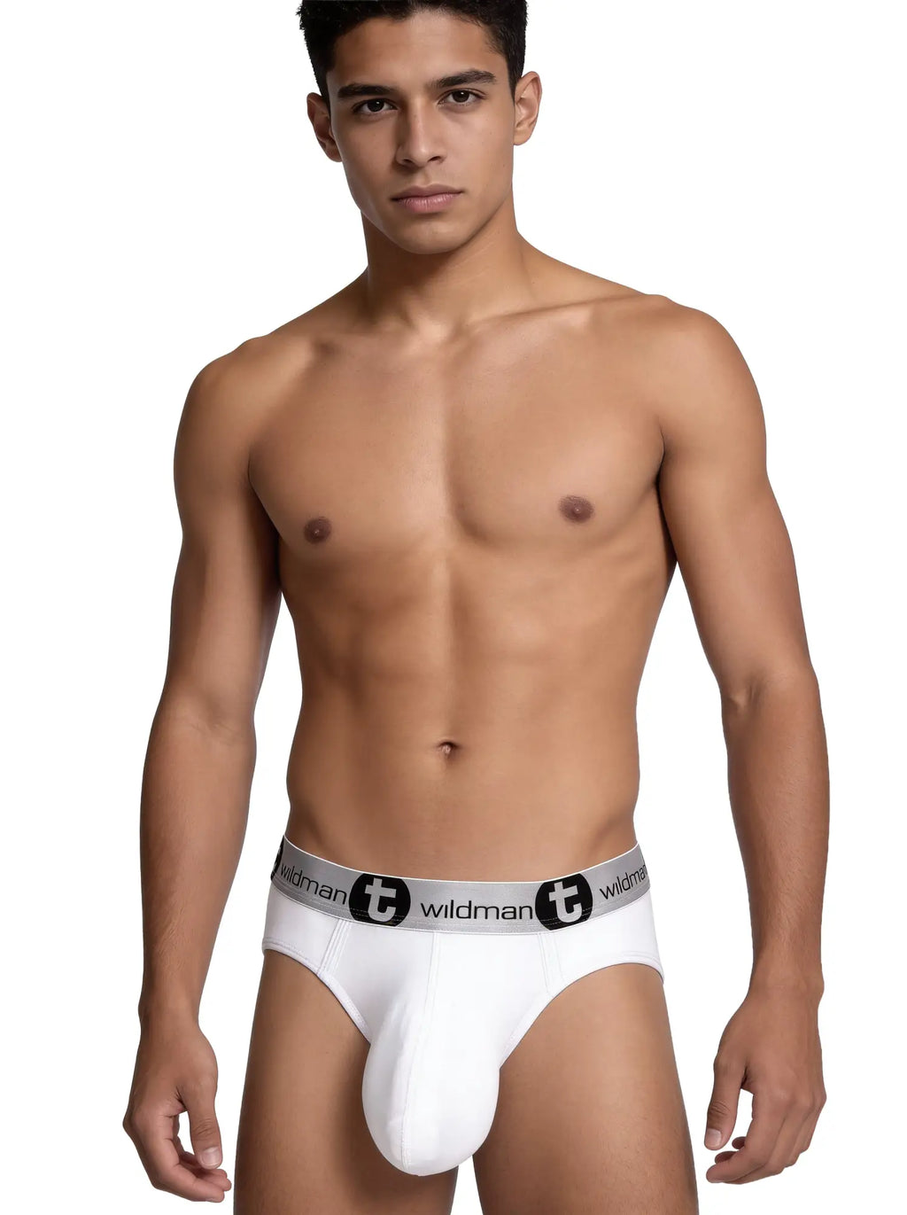 A man wearing white WildmanT Modal Monster Cock briefs featuring a wide, branded gray elastic waistband.
