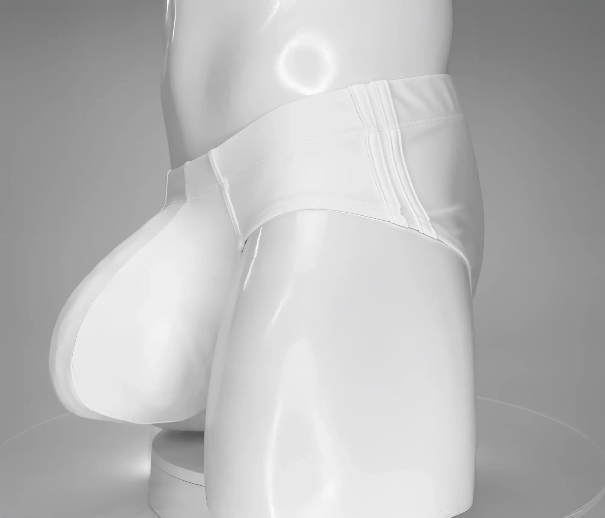 White WildmanT swim brief on a mannequin, featuring a contoured front pouch and triple-stitched side panels.