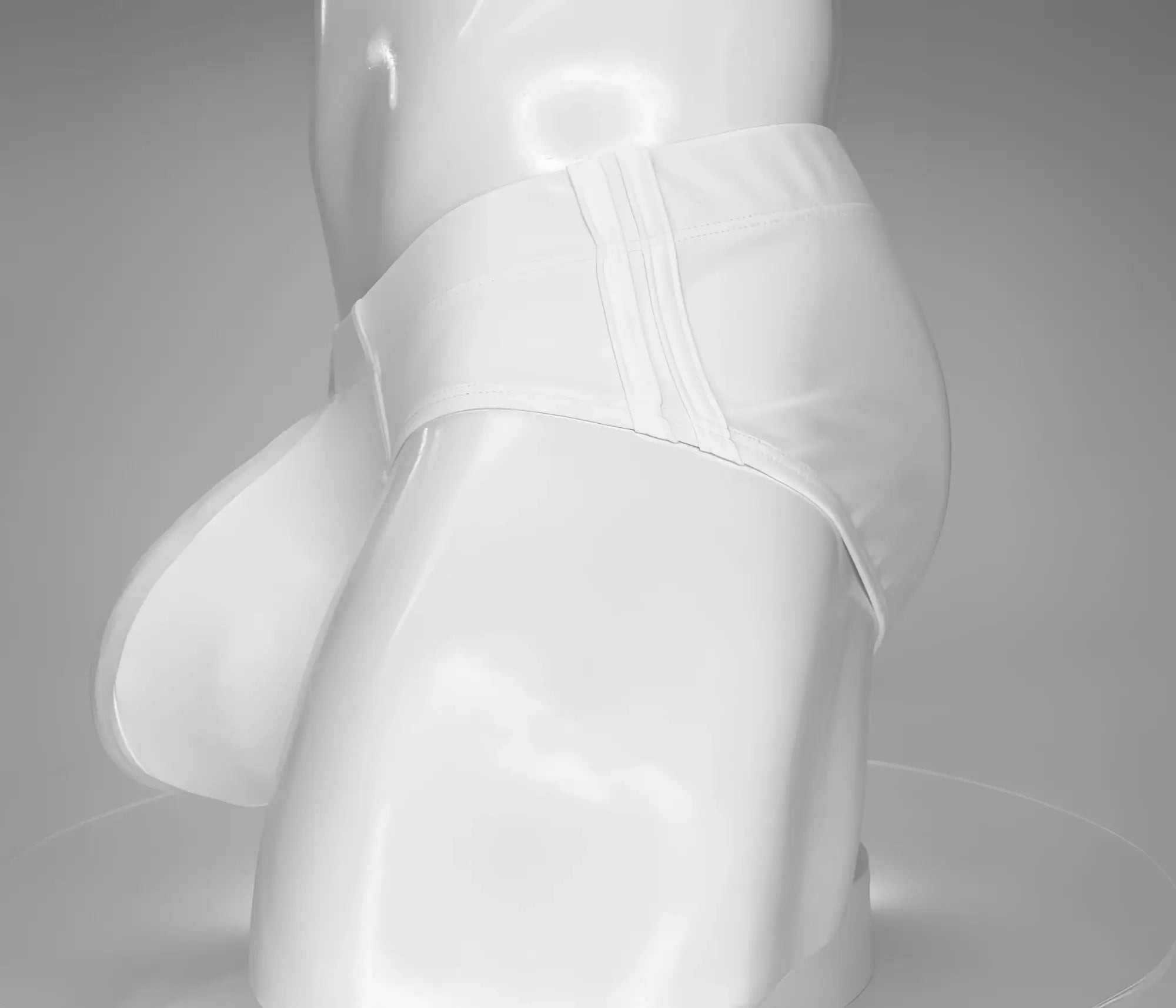White WildmanT swim brief on a mannequin, featuring a contoured front pouch with triple-stitched side detailing.