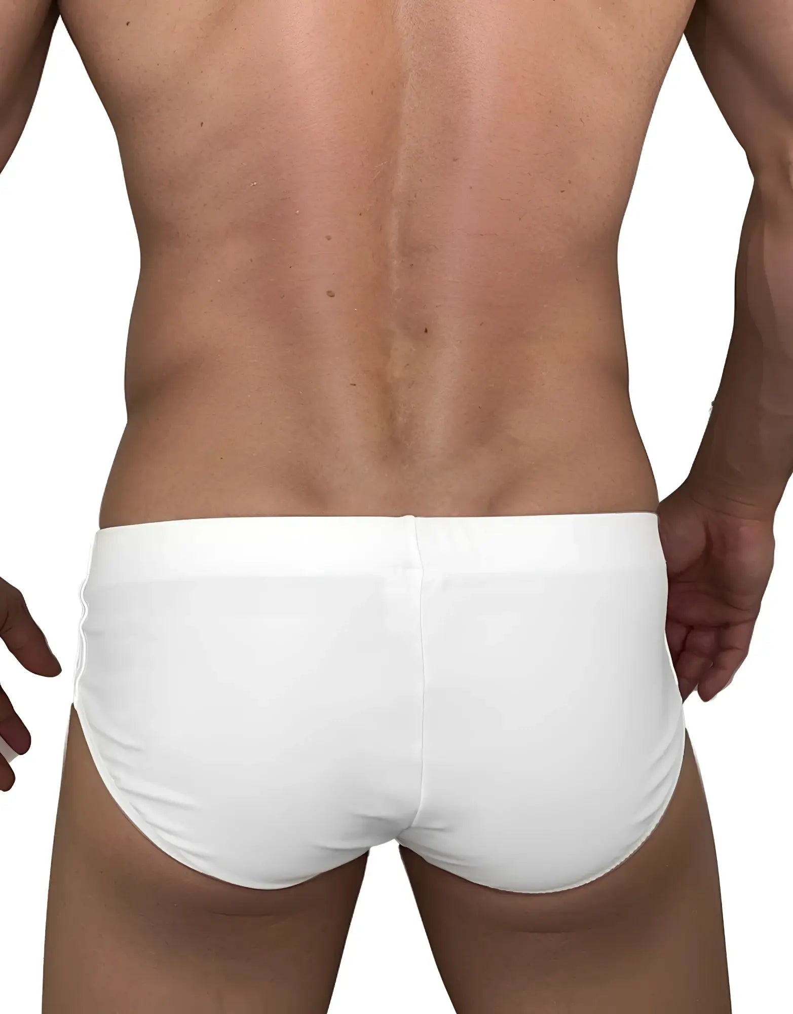 Back view of a male model wearing plain white WildmanT swim briefs with a form-fitting, minimalist cut.