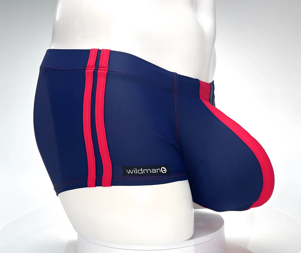 Navy blue swim square cut with red side stripes and pouch detail, featuring a "wildmant" label on a white mannequin.
