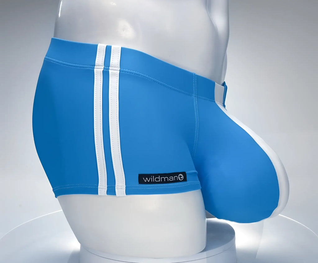 Teal square cut swim trunks with dual white side stripes and a prominent contoured pouch on a white mannequin.