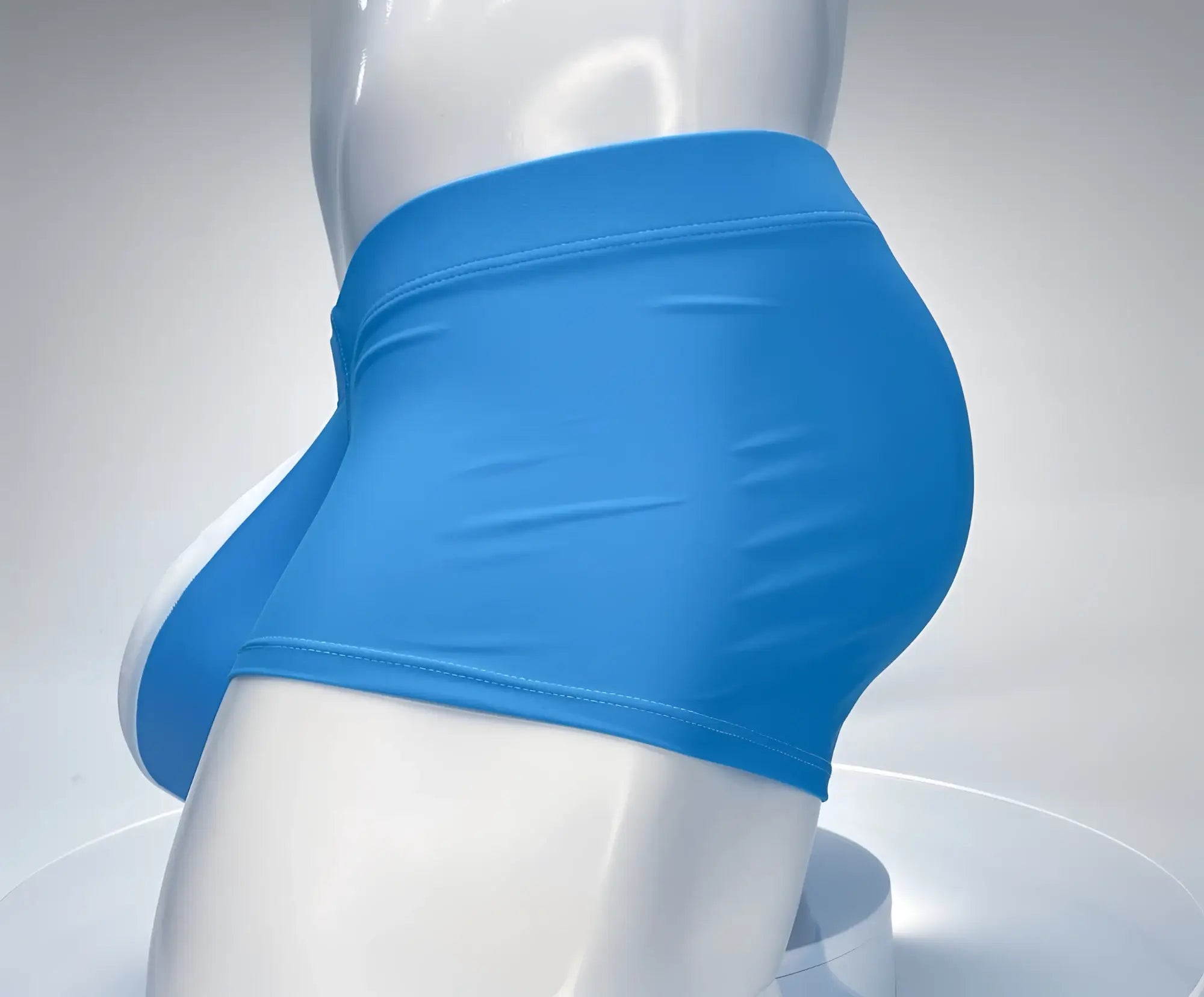 Teal and white WildmanT square-cut swim trunks on a white mannequin torso, side view.