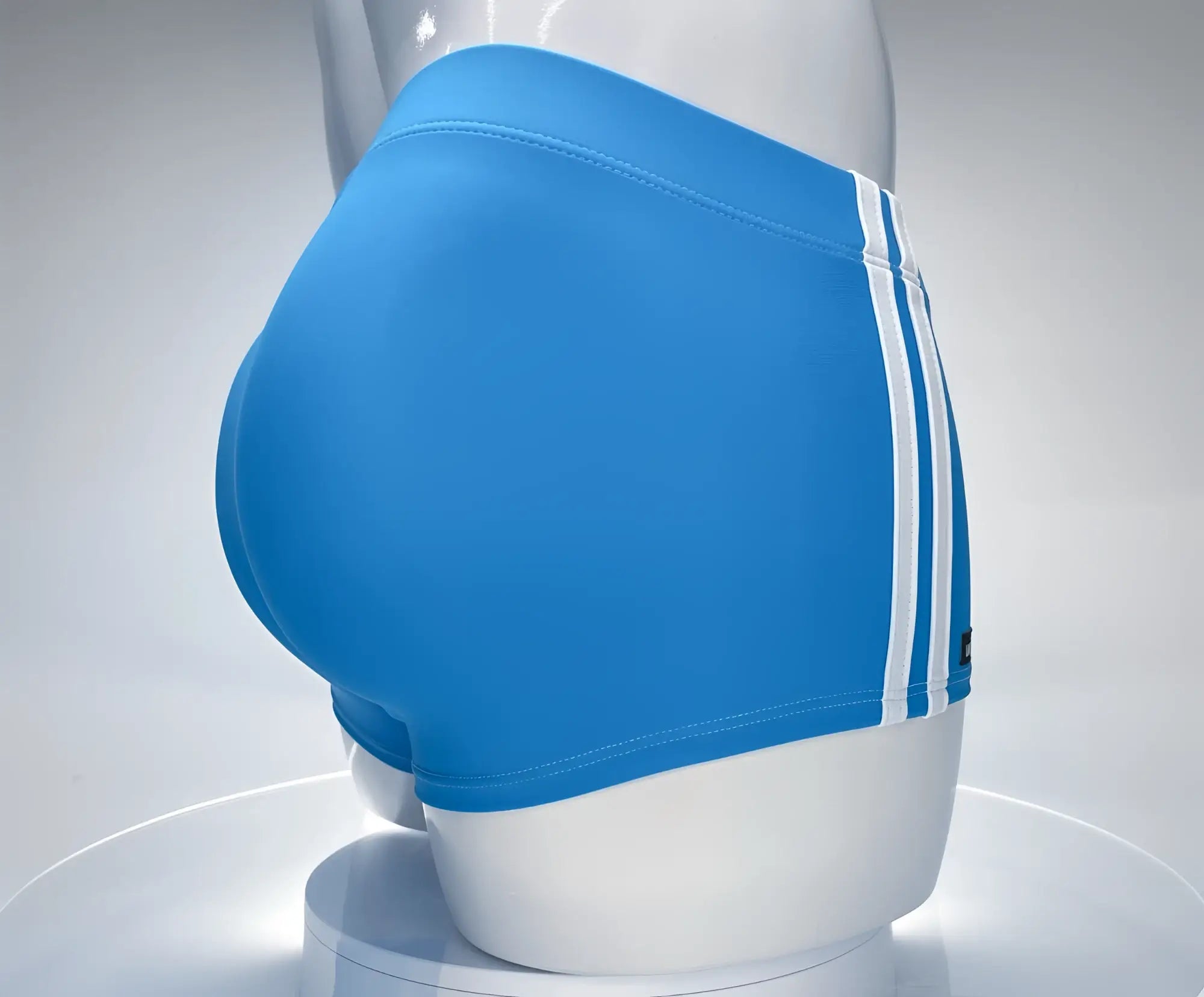 Teal blue square-cut swim trunks with two vertical white side stripes, displayed on a white mannequin.