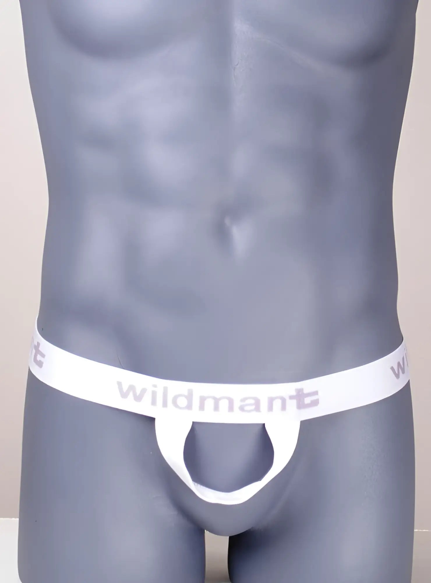 White WildmanT Original Ball Lifter jockstrap with a branded elastic waistband and open-front pouch on a mannequin.