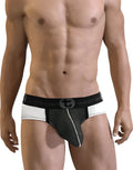 A man wearing white and black see-through pouch briefs with a wide "Wildman" branded waistband.