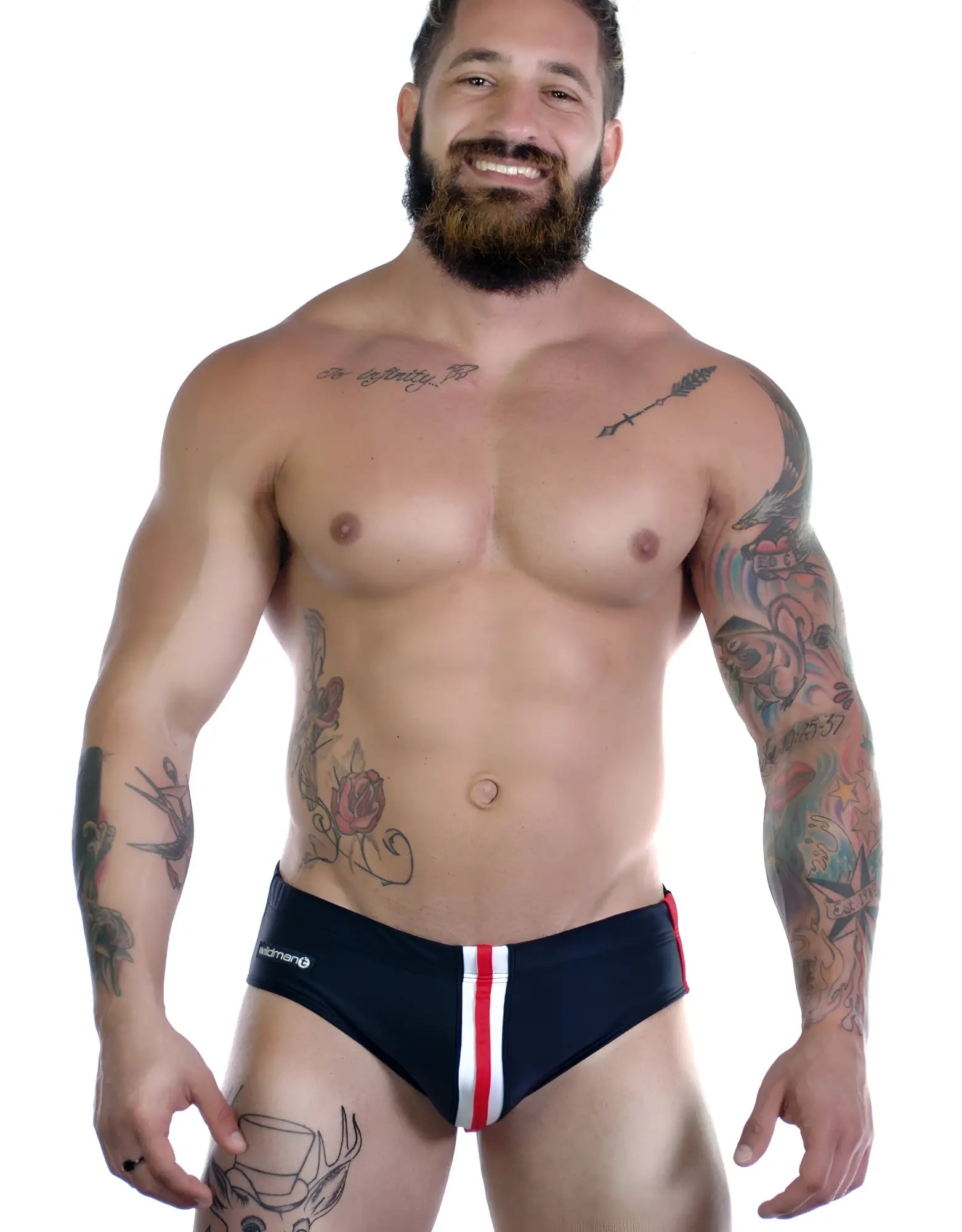 Sportivo black bikini with vertical red and white stripes down the center, worn by a smiling tattooed man.