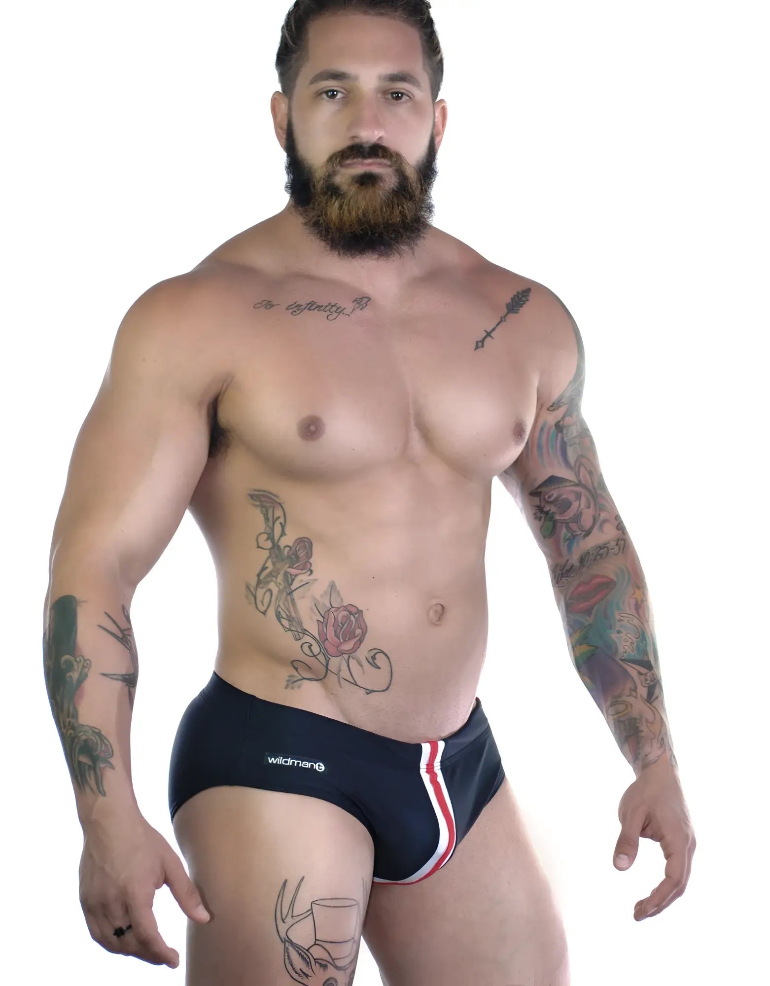 Muscular man wearing a black Sportivo bikini brief featuring a white and red vertical front stripe.