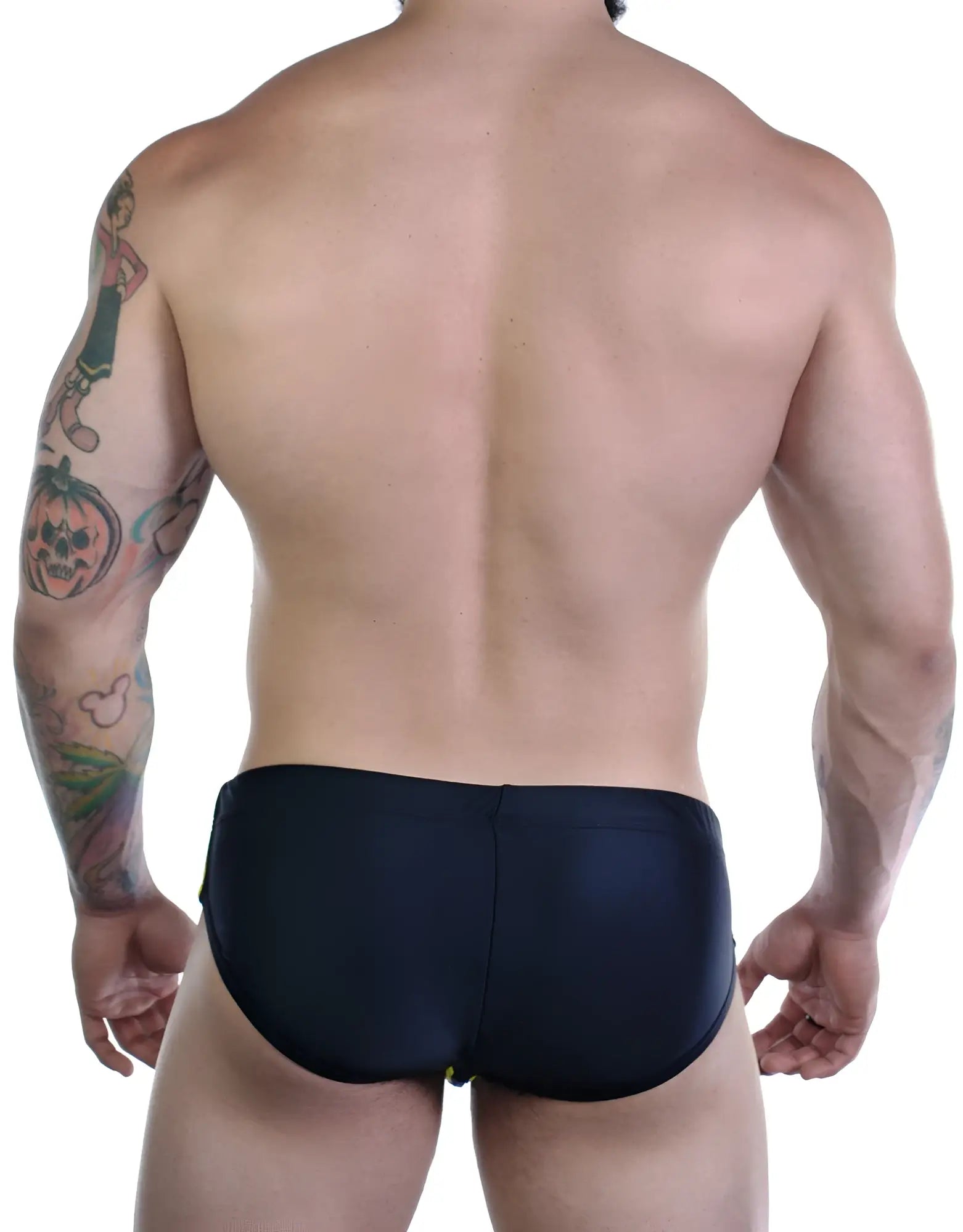 Back view of a muscular man wearing black Sportivo bikini swimwear with subtle yellow side accents.