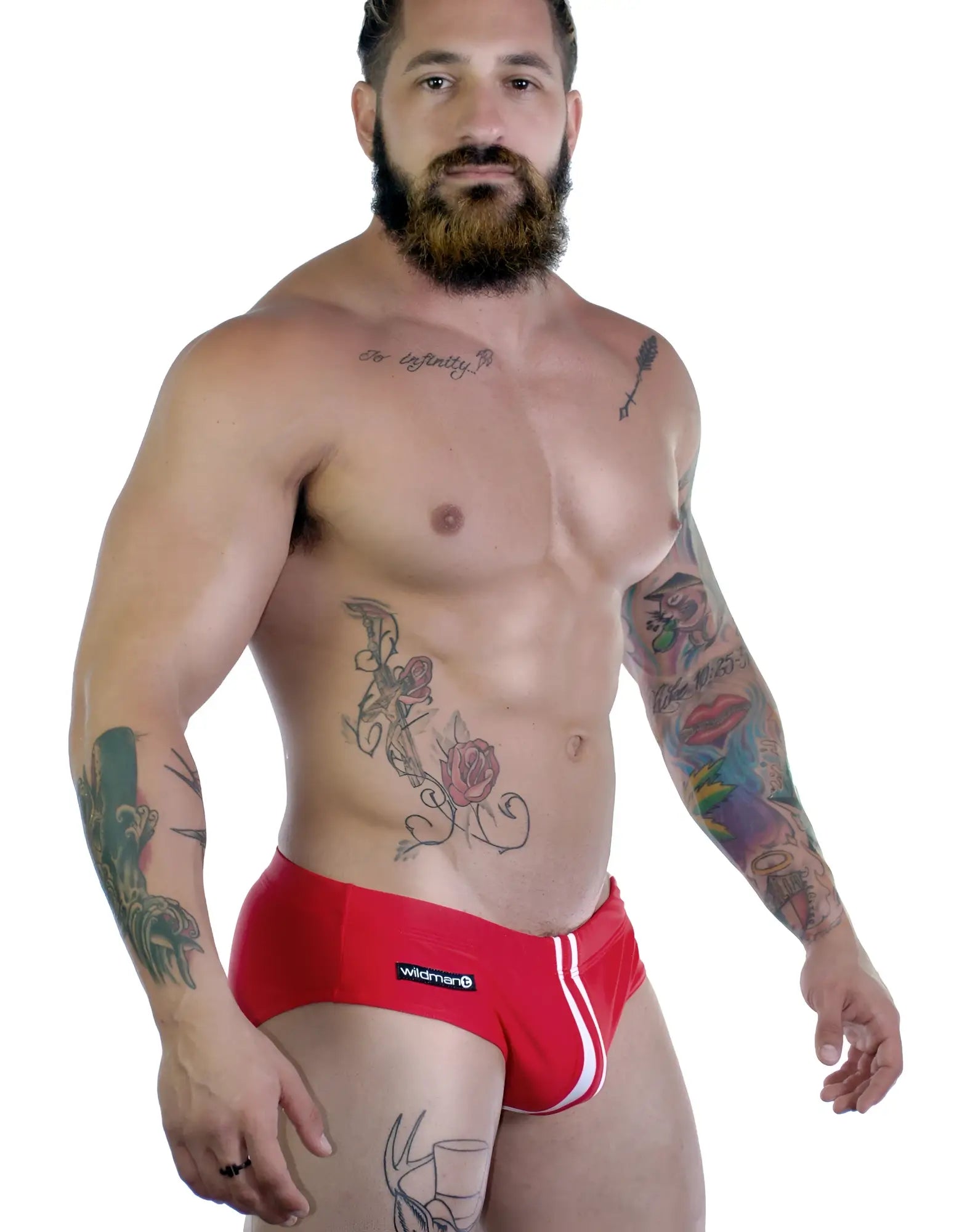 Sportivo Bikini in red with vertical white stripe detail and a Wildman logo patch on the hip.