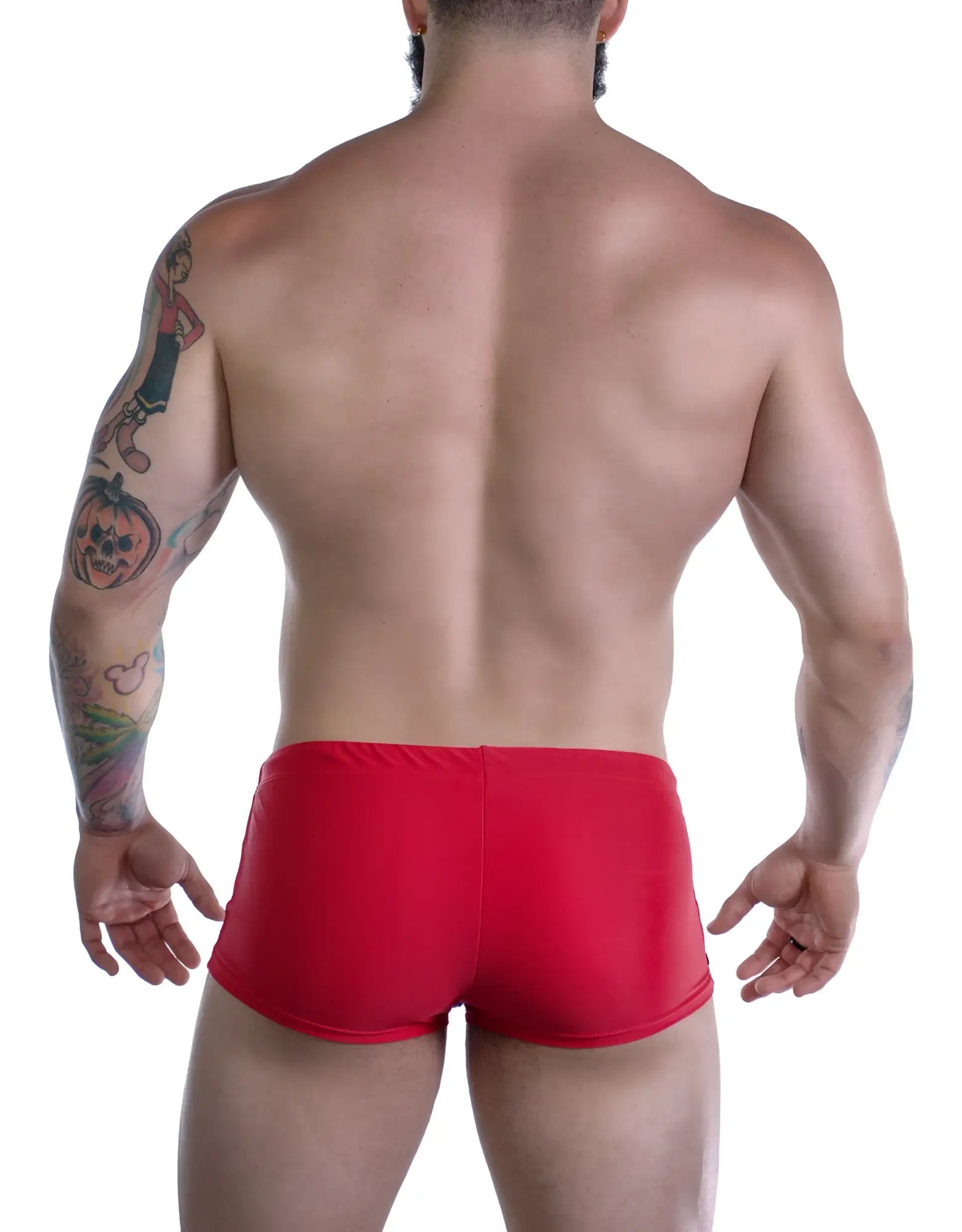 Back view of a muscular man wearing Sportivo red square-cut swim trunks.