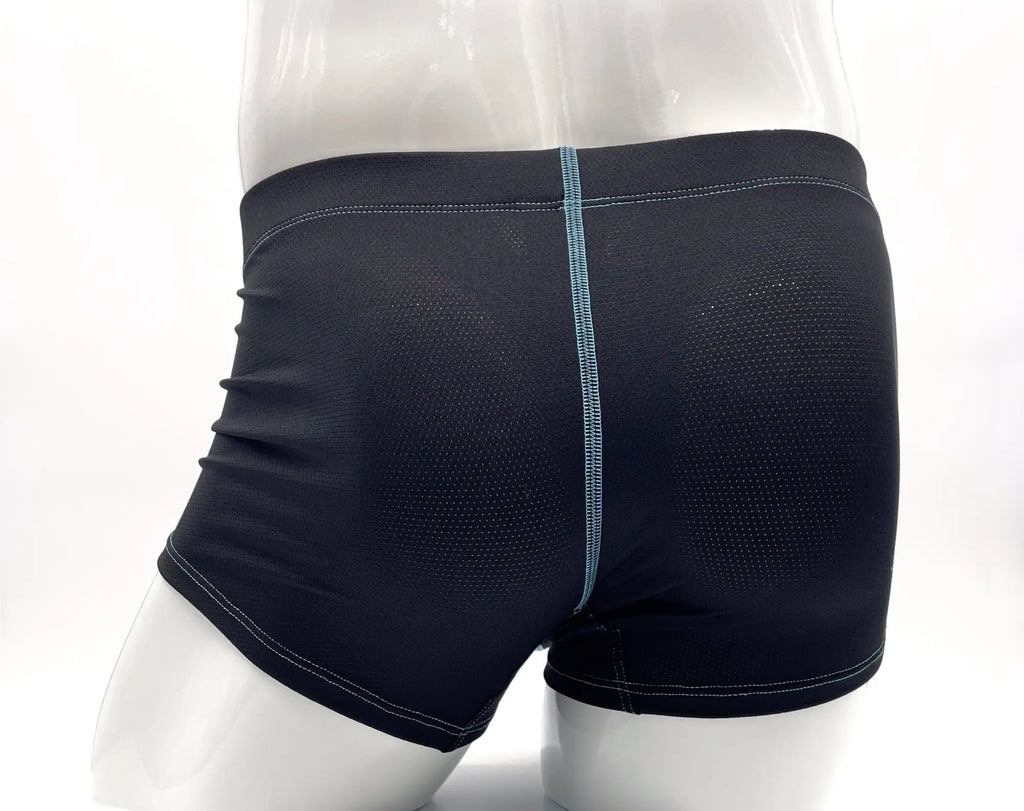 Back view of dark navy perforated boxer briefs with a vertical light blue stitched seam on a white mannequin.