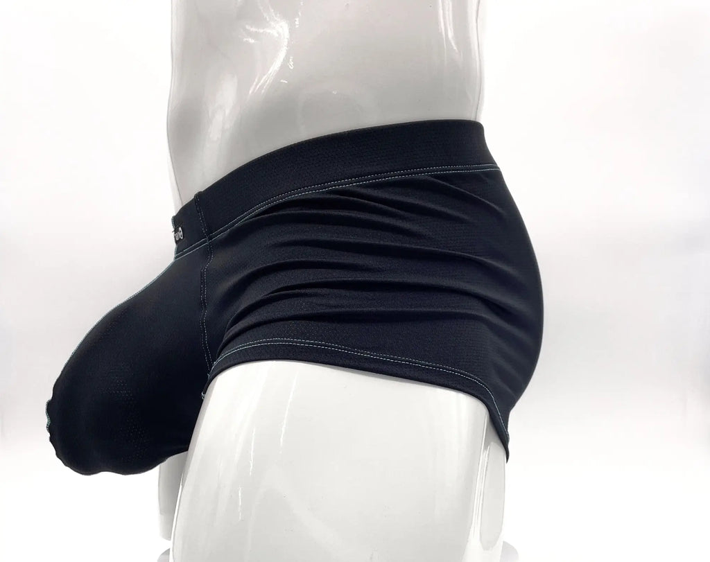 Side view of blue "Big Boy" pouch boxer briefs on a mannequin, featuring textured fabric and contrasting stitch details.