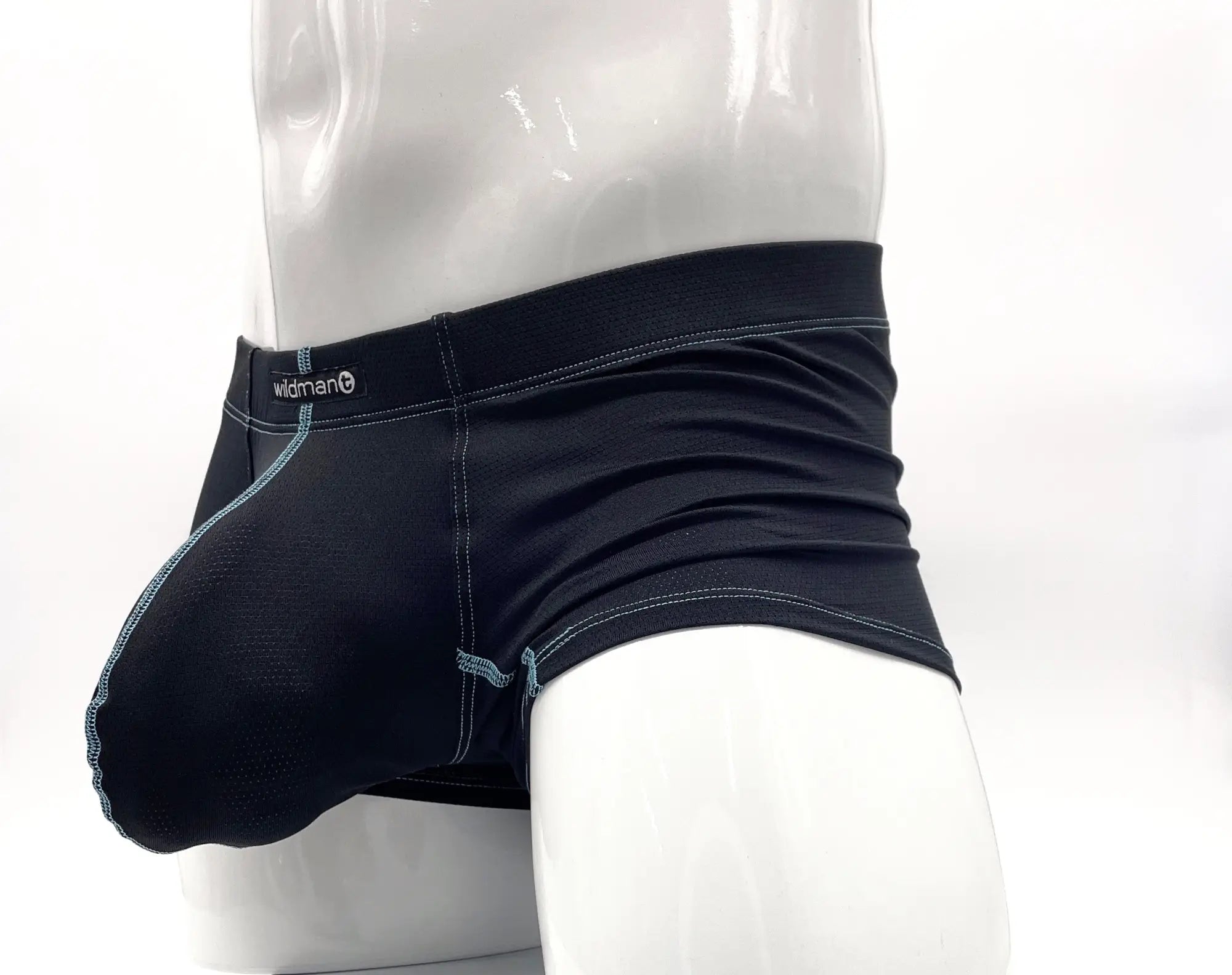 Black boxer briefs with a front pouch, featuring contrasting blue stitching and a Wildman logo on a mannequin torso.