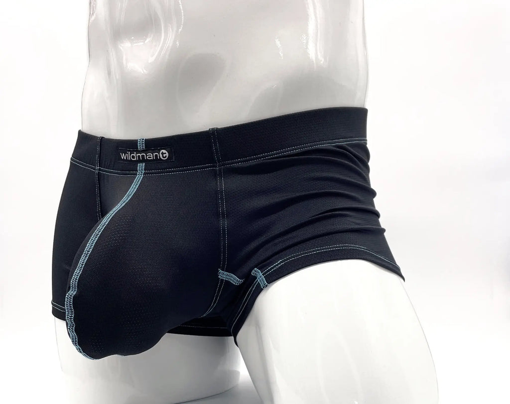 Black boxer briefs on a mannequin, featuring a large anatomical pouch with contrasting blue decorative stitching.