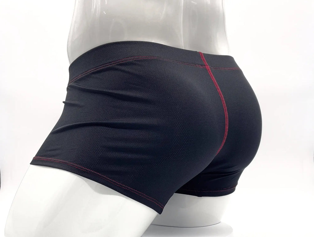 Black mesh boxer briefs with red contrast stitching, shown on a mannequin from a side-rear angle.