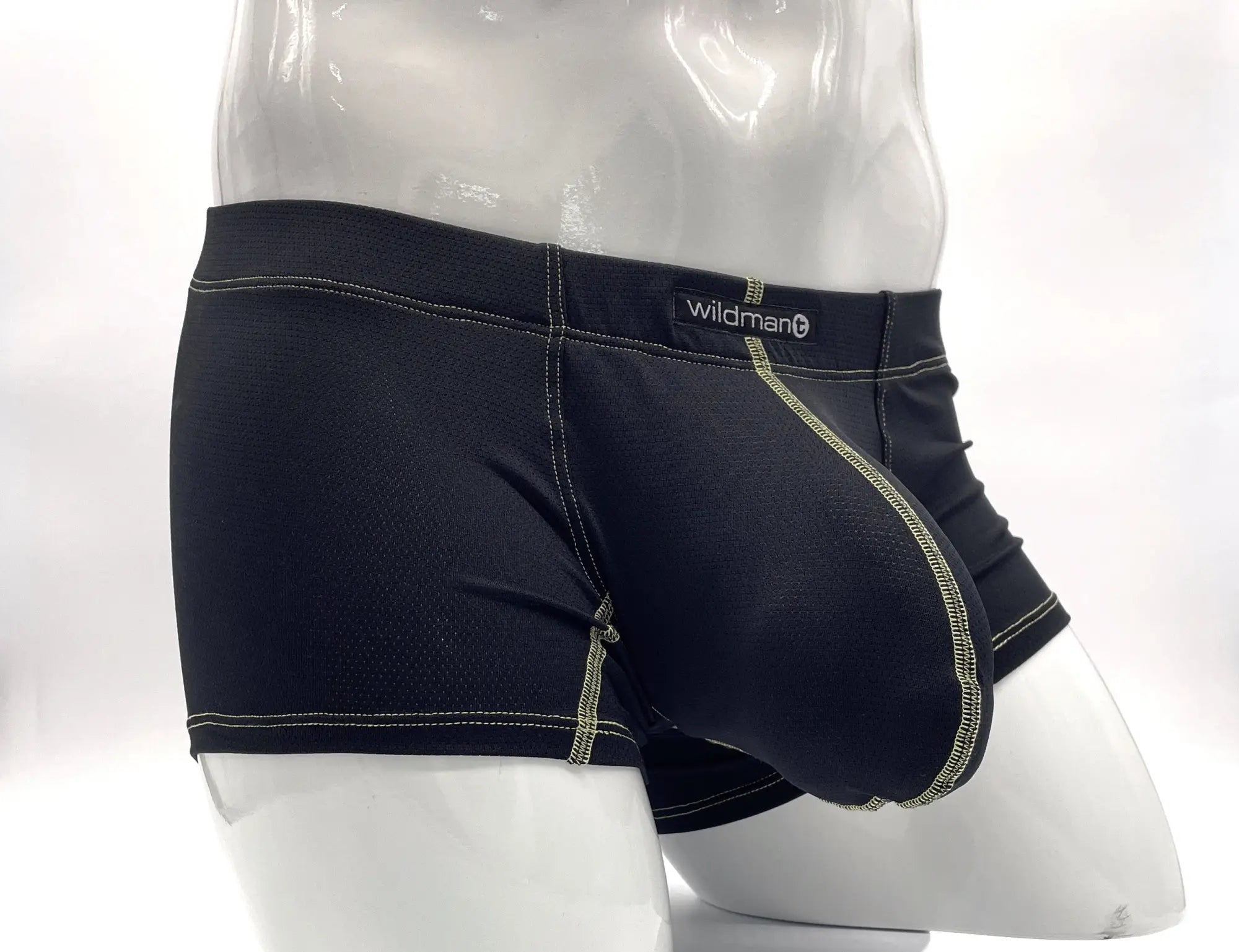 Black boxer briefs with a large contoured pouch, featuring yellow contrast stitching and a WildmanT logo on the waist.
