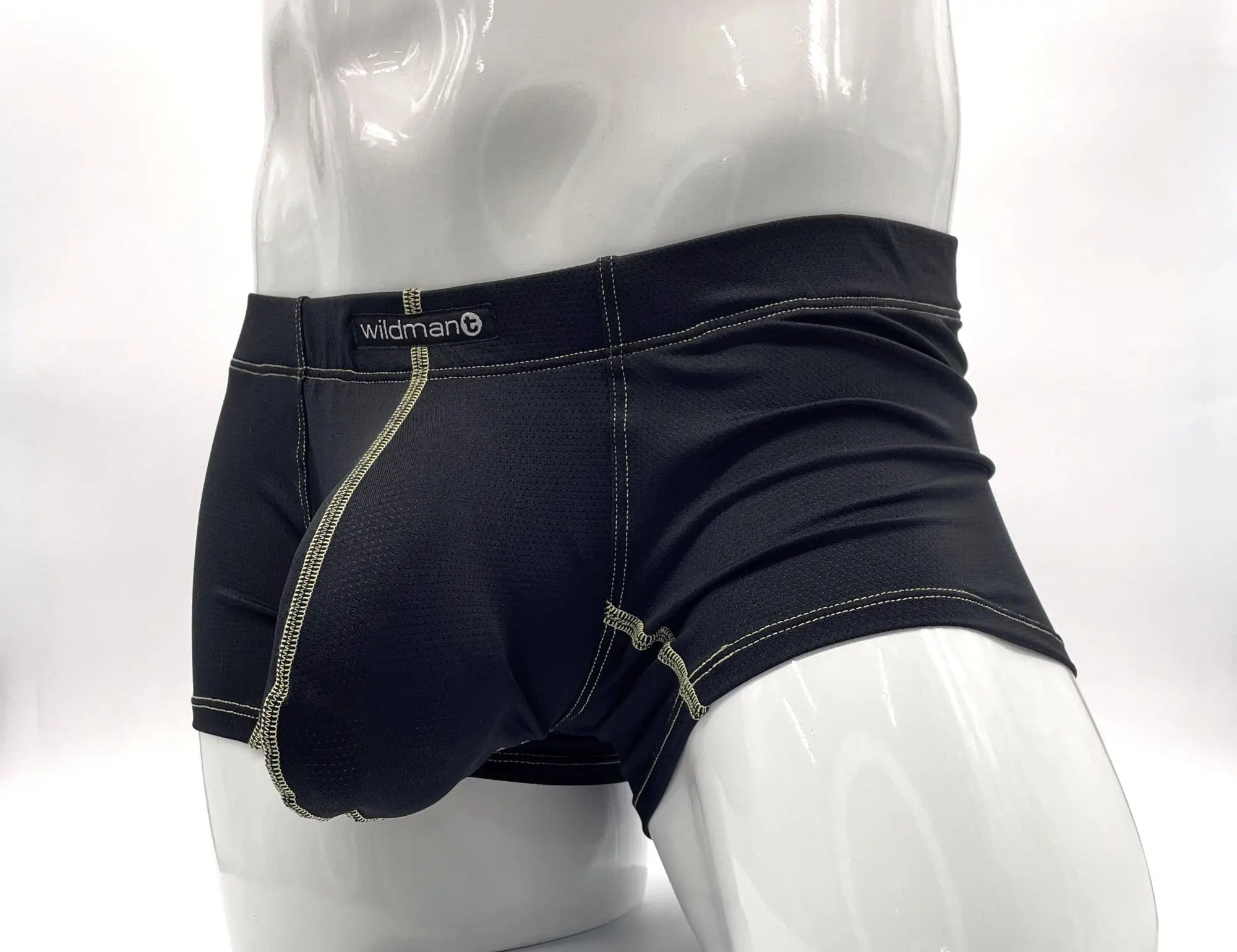Black Wildmant Big Boy pouch boxer briefs featuring prominent yellow contrast stitching on a mannequin.