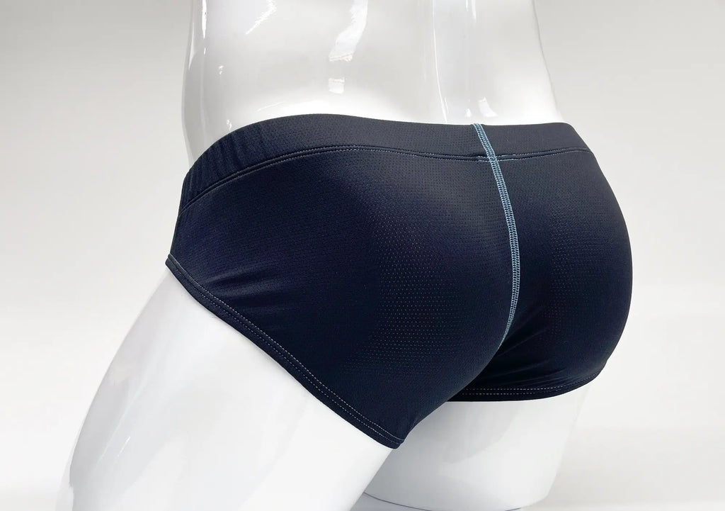 Blue mesh pouch briefs on a white mannequin, featuring a contrasting light blue vertical back seam.