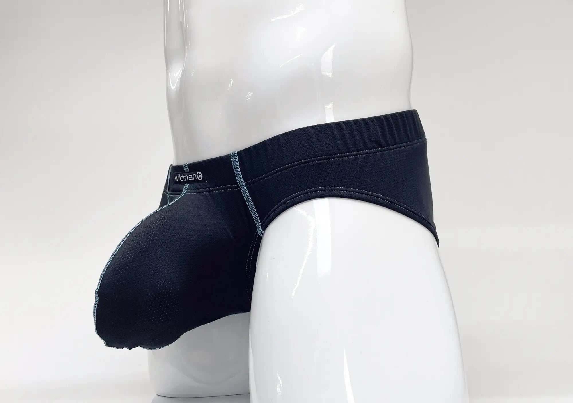 Blue Stitch Big Boy pouch brief on a white mannequin featuring a textured fabric and light blue contrast stitching.