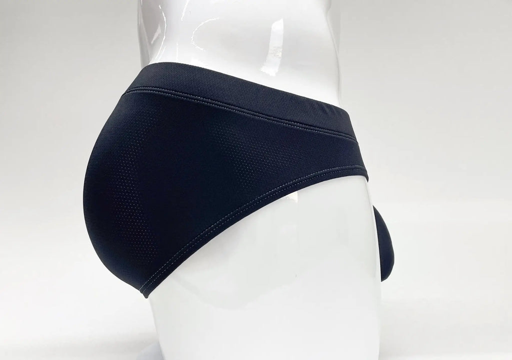 Blue Stitch Big Boy Pouch Brief on a white mannequin, featuring perforated fabric texture and reinforced stitching.