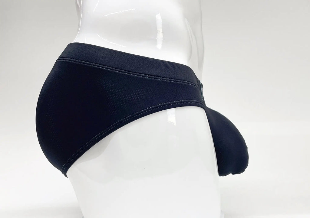 Stitch Big Boy Pouch Brief in blue on a mannequin, featuring a textured fabric and a prominent front pouch design.