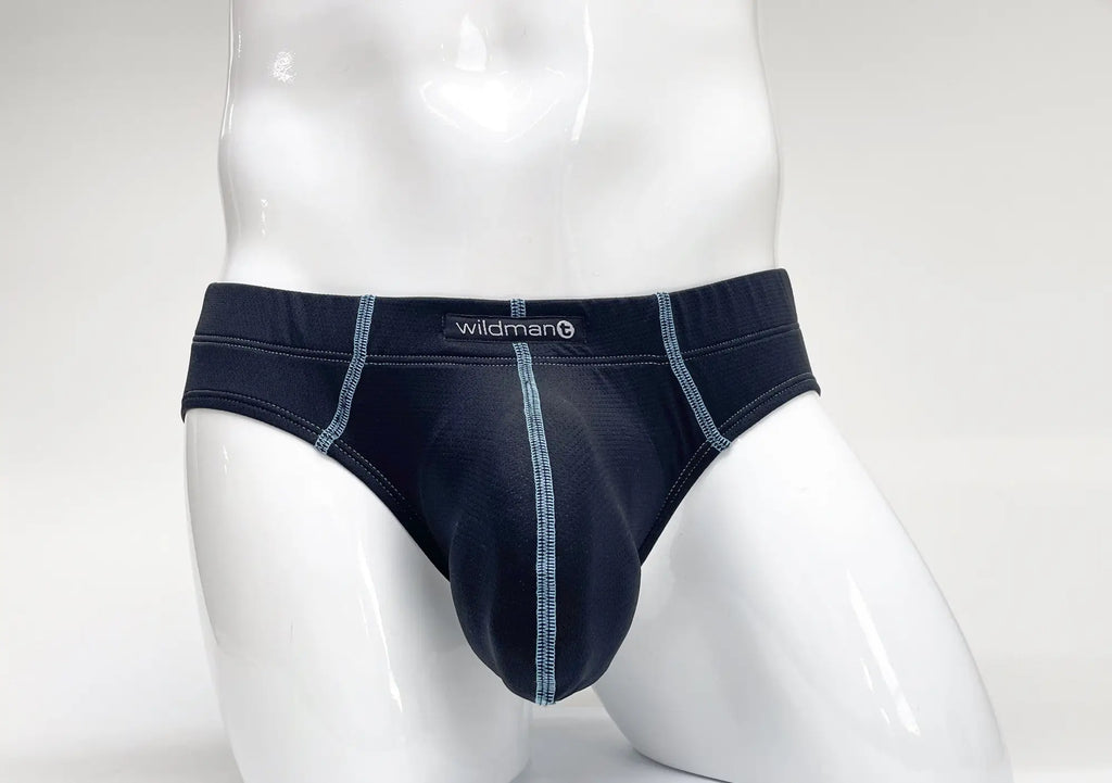 Navy blue Stitch Big Boy pouch brief on a white mannequin, featuring contrast light blue stitching and Wildman logo.