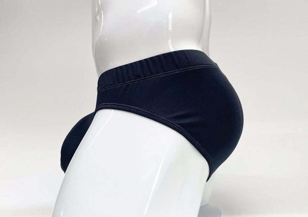 Blue Stitch Big Boy pouch brief on a white mannequin, featuring a side profile view with supportive pouch design.