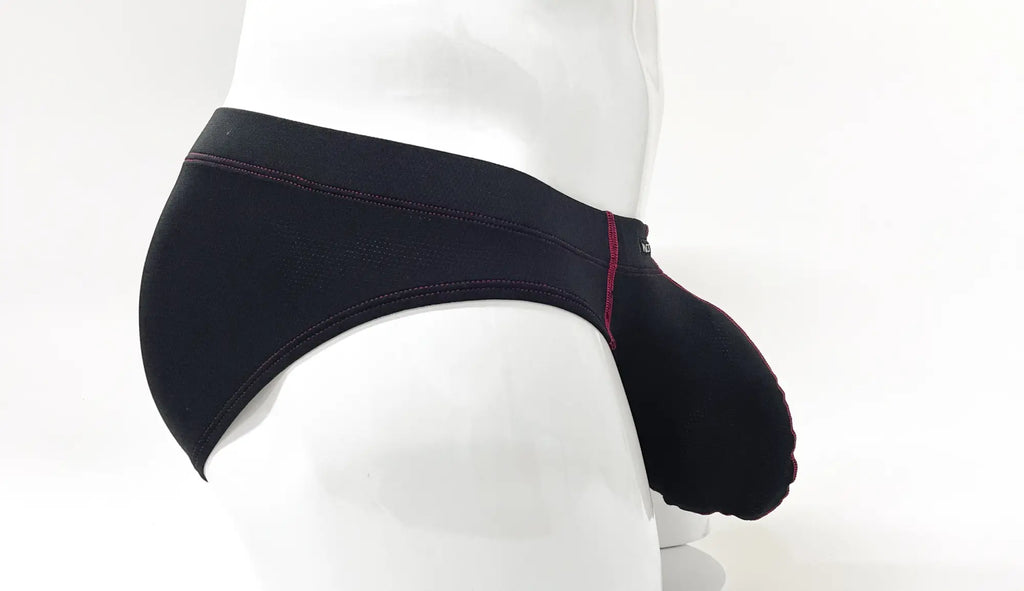 Stitch Big Boy Pouch Brief in black featuring a prominent front pouch and decorative red contrast stitching.