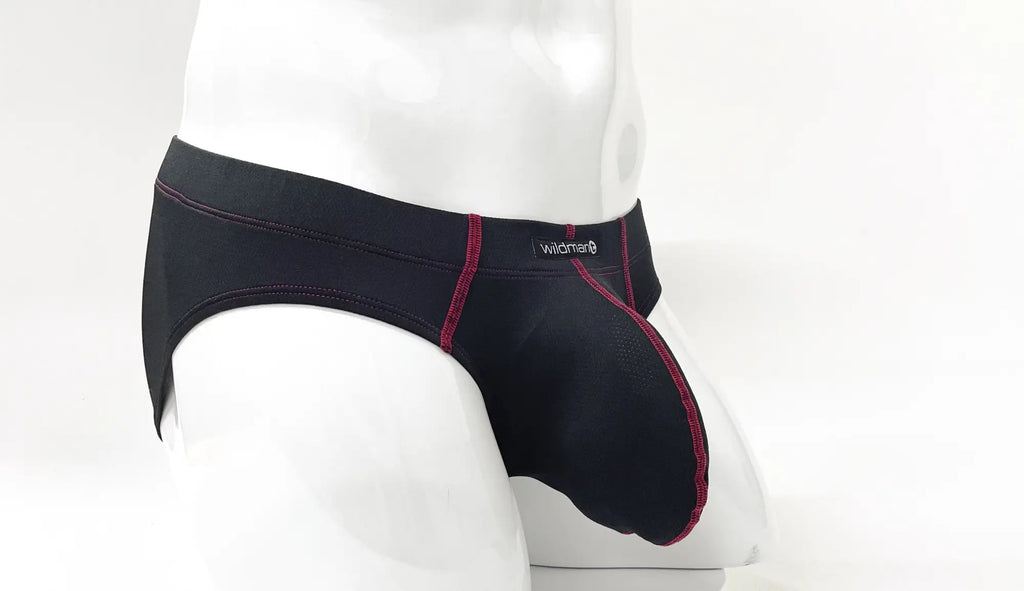 Black Wildman pouch brief with red contrast stitching on a white mannequin.