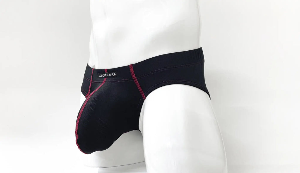 Black Stitch Big Boy pouch briefs with contrasting red stitching and Wildman logo on a white mannequin.