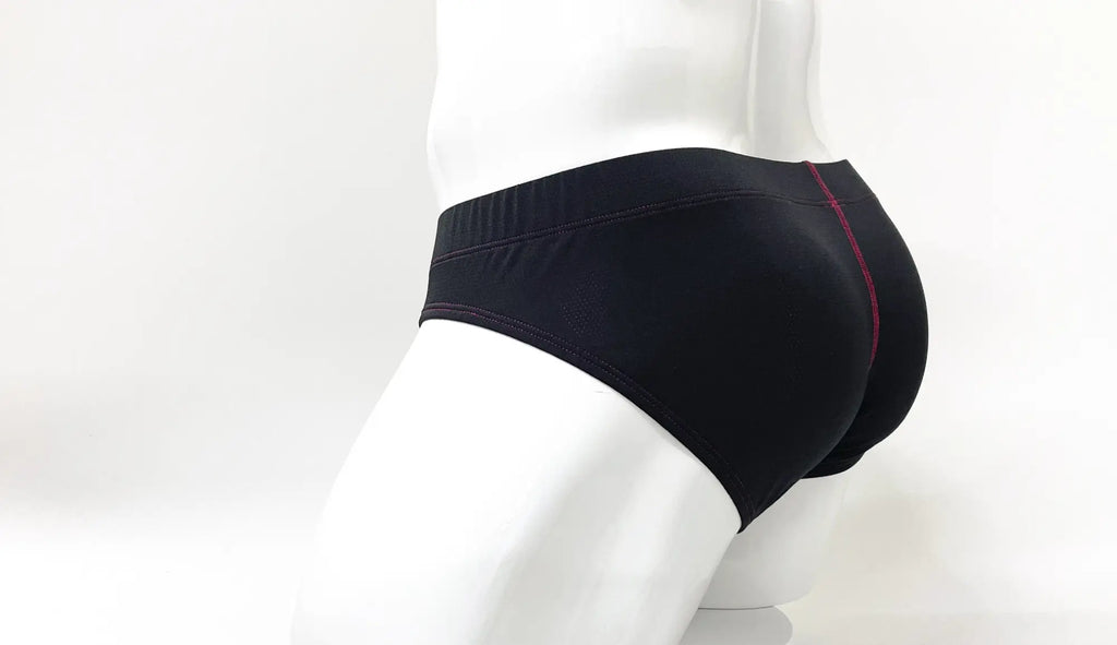 Black Stitch Big Boy pouch brief on a mannequin, featuring contrast red stitching along the rear seam.