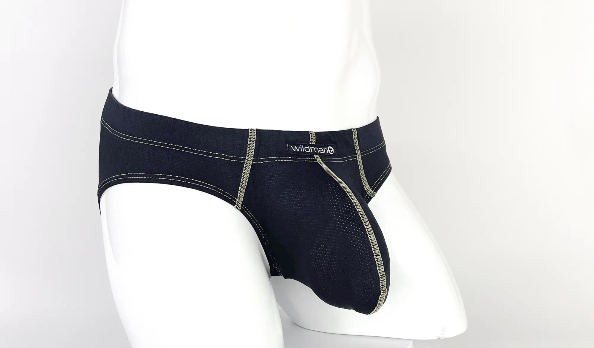 Black Stitch Big Boy pouch brief on a mannequin, featuring textured fabric, contrast stitching, and Wildman logo tag.