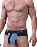 Black and light blue stretch cotton pouch brief with a branded elastic waistband on a fit male model.
