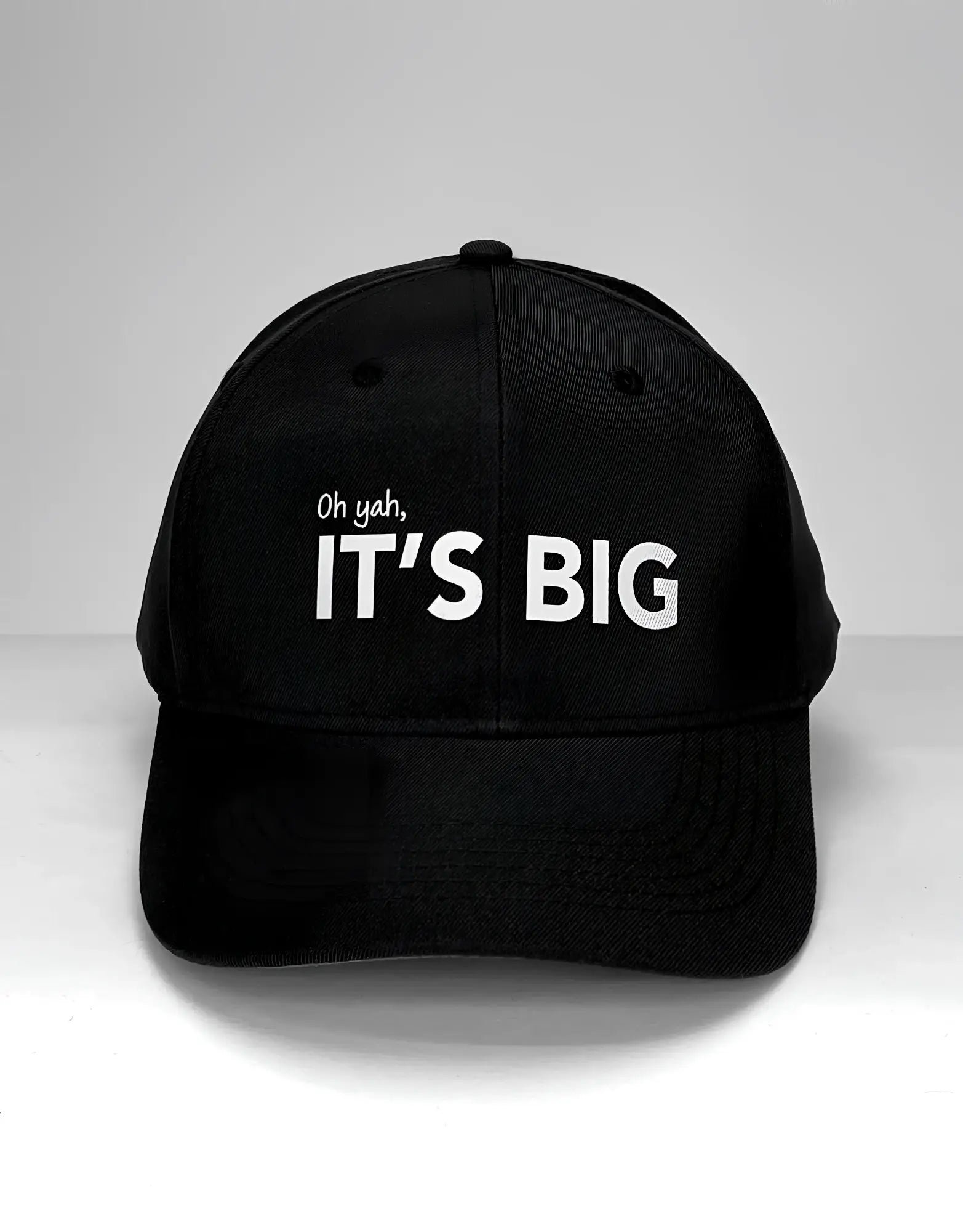Black baseball cap featuring the text "Oh yah, ITâ€™S BIG" embroidered in white on the front.
