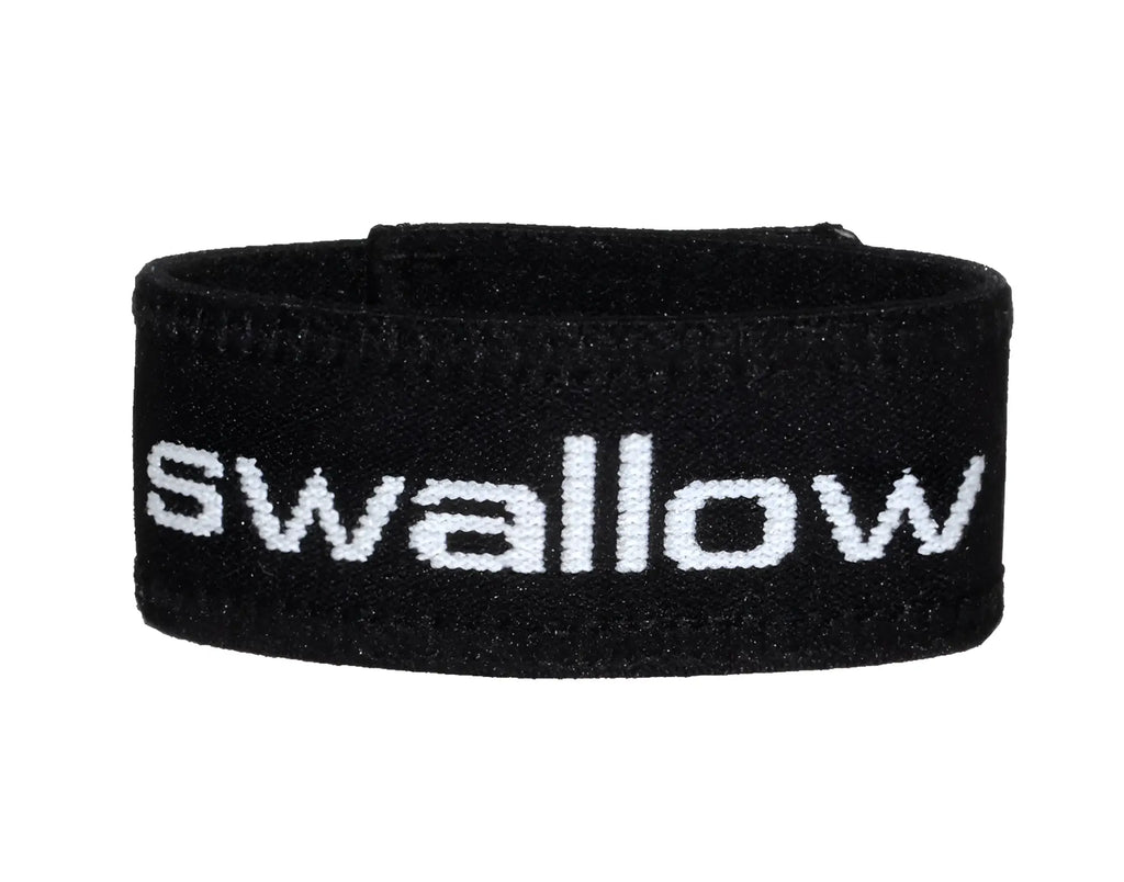 Black elastic cock ring with the word "swallow" embroidered in white text on the front.