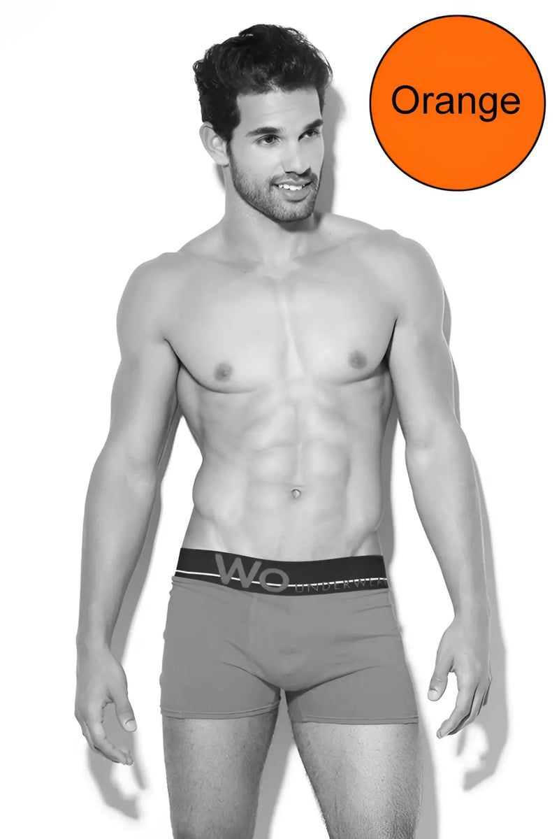 Orange waistband with wo logo on black elastic band of wo underwear solid boxer brief size s