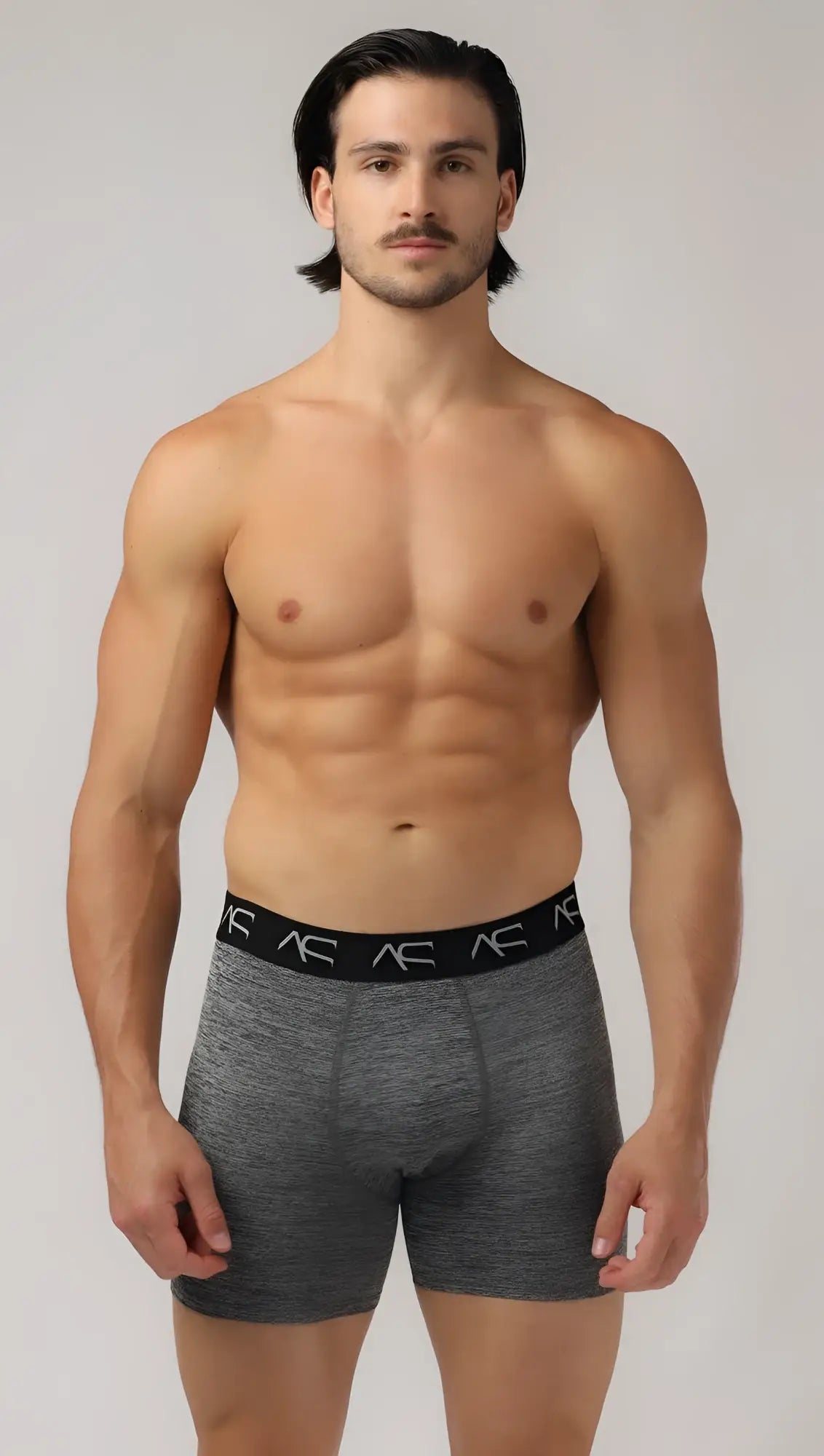 Gray heathered boxer briefs workout trunks with black ac logo waistband designed for active use and comfort