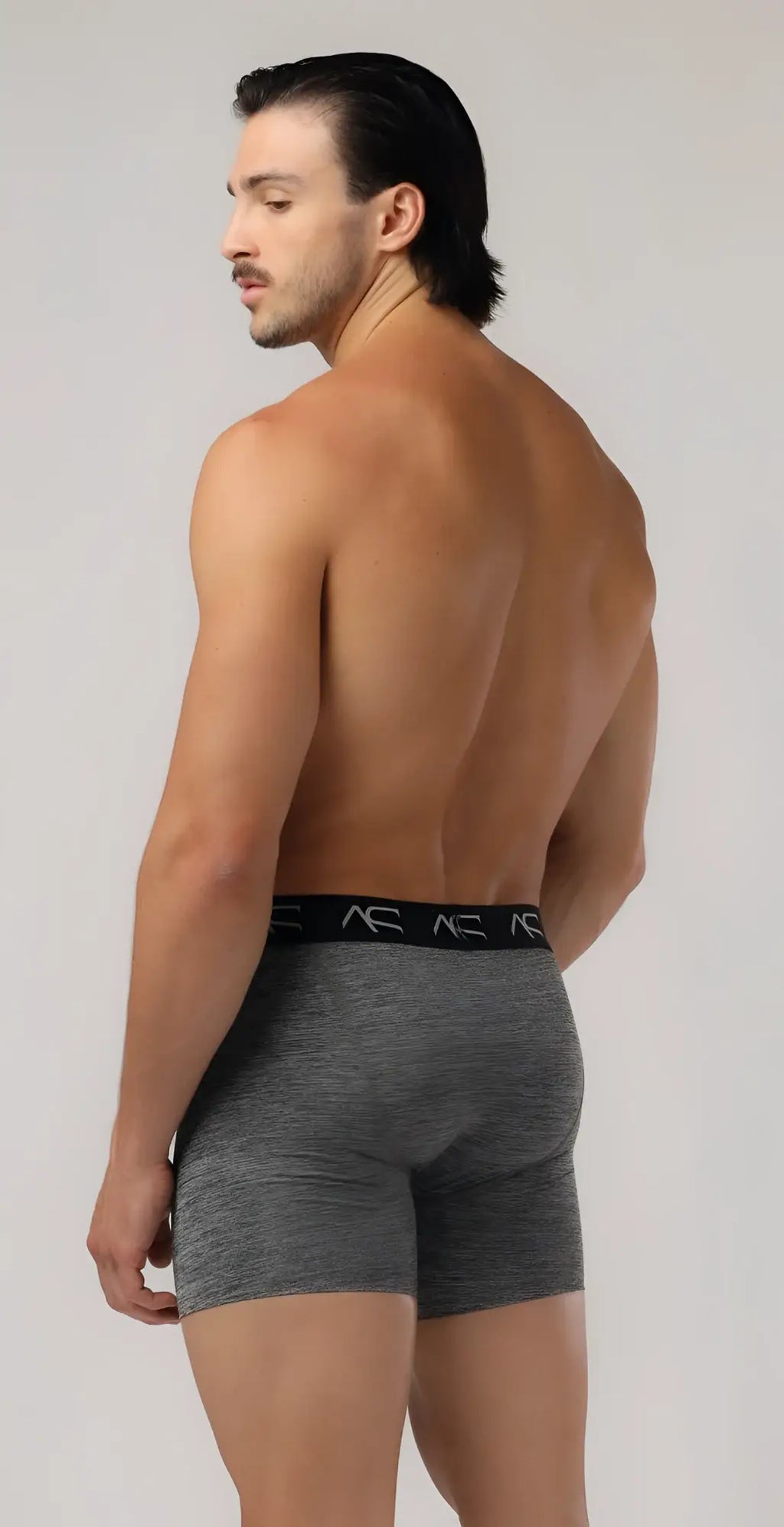 Gray heathered boxer briefs workout trunks with black elastic waistband featuring repeating ac logos